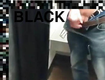 Fighting off a silky black satin dress in the locker room