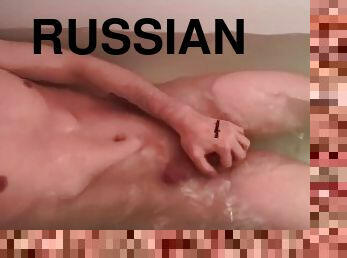 Young Russian guy Kirill takes a bath and enjoys his body and juicy dick