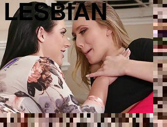 Angela White and AJ Applegate pleasuring each other in bed