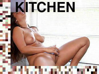 Eva Lovia tease her tits & masturbates on the kitchen counter