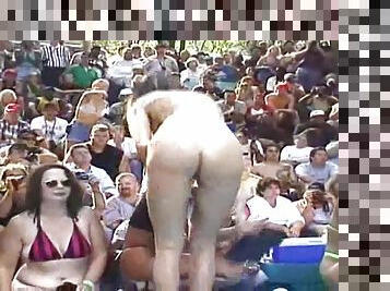 My naked horny wife is fully naked in the public show