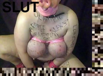 Humiliating slut takes on bad dragon on live cam