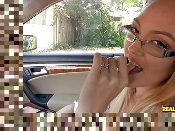 Heather Hamilton gives a naughty blowjob in the car