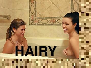 Teen girls have fun in the bathtub