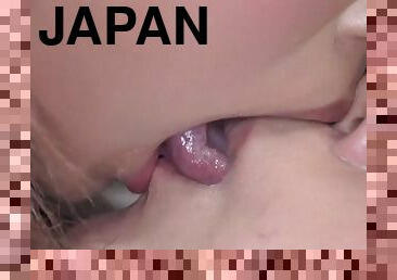 Cute japanese lesbian enjoy a hot tongue kissing session