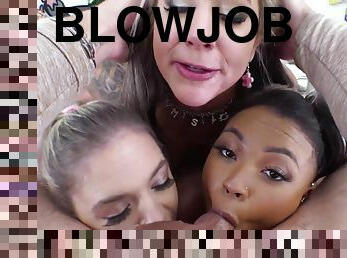 POV interracial foursome with cum on face: Three lovely ladies take turns sucking this huge cock until he spews his load