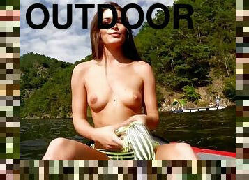 Athletic babe masturbates in the outdoors