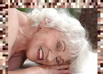 Granny takes masseurs cum
