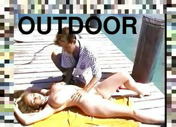 He rubs sunscreen on the hottie and eats her pussy