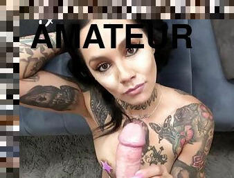 Tattooed brunette drops to her knees to gobble up a cock - Hd