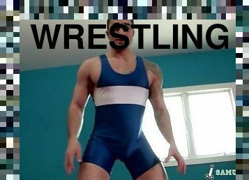 Wrestling singlet is sexy on his muscular body