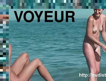 A young woman on the beach voyeur hot hunter