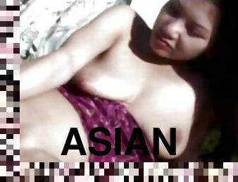 Nasty Asian slut plays with big toy outdoors - amateur homemade