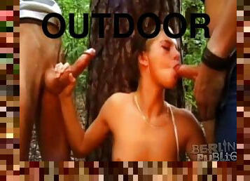 Threesome in the woods with party girl