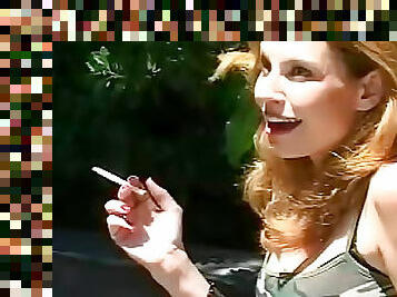 Pornstar Jamie Lynn smokes outdoors