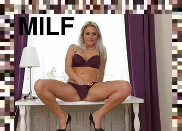 Dashing MILF takes off her panties for some insolent fun