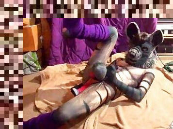 Whiney hyena takes his dildo