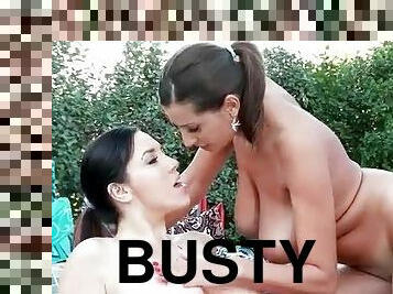 Busty lesbians are into sucking titties