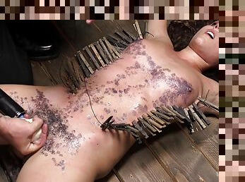 Teen babe gets covered in wax during a pretty harsh BDSM play