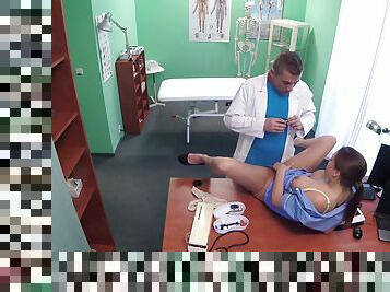 Unfaithful husband's clandestine fuck in a medical exam room