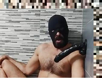 Masked daddy moans and sucks dildo