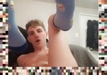 Horny twink slut with socks fucks his hole until it gapes!