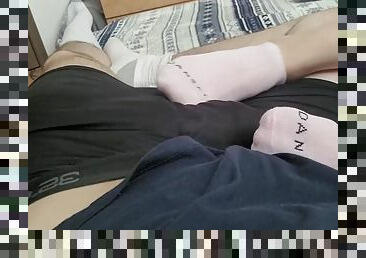 Footjob in socks leads to a huge cumshot on feet