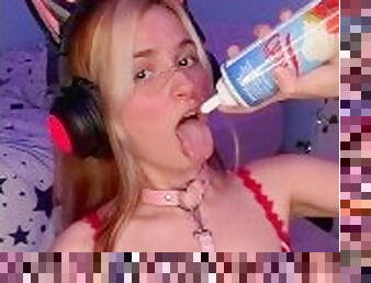 Egirl in lingerie puts cream in her mouth