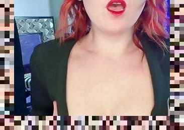 Sexy Redhead teases you with perky tits.