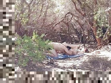 Amateur couple sneak off the beach