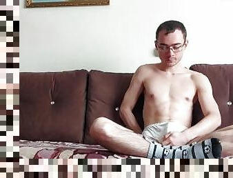 Nerdy college boy masturbates after classes and he likes to cum in his socks!