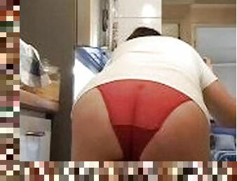 in the kitchen with a garter belt