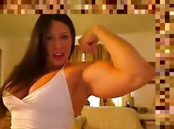 Busty muscular girl flexing lustily