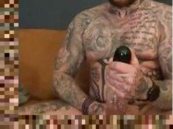Tattoed Hunk loves to jerk with his toy