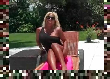 Blonde pornstar Desiree Lopez in one piece swimsuit