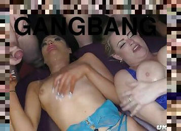 Amazing gangbang at a Christmas party with four lusty sluts!