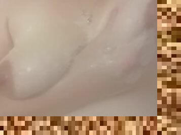 Playing with my tits in the shower.