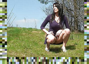 Watch busty girl take a piss outdoors