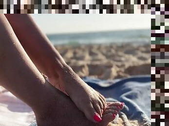 Naked on a nudist beach and paying with her feet - allfootsiefans