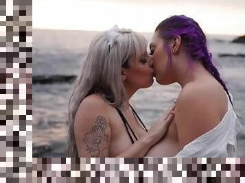 Hot lesbian sunset make out with titty play