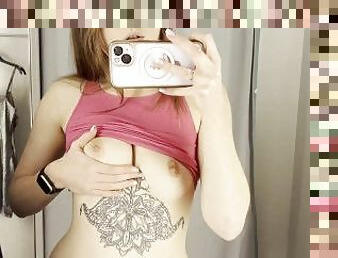 Shameless girl shows her tits and ass in the fitting room Uncensored
