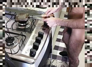 HAIRY NUDIST PREPARING BREAKFAST