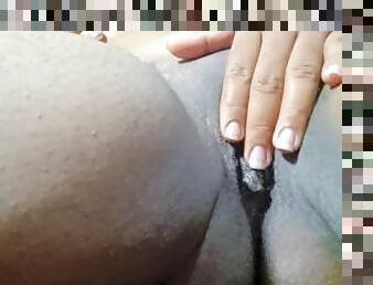 Ebony milf with shaved pussy masturbates with her fingers in hot video call