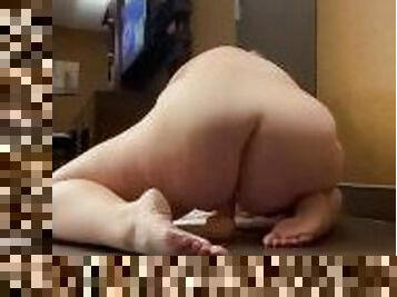 Chubby girl fucks her dildo in the hotel
