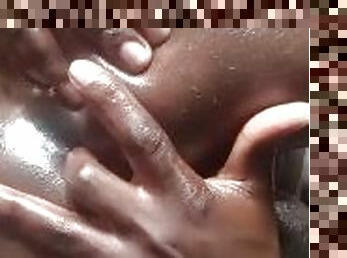 Fat ass kenyan oiling and fingering his asshole