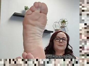 Piper teases the office desk with meaty soles