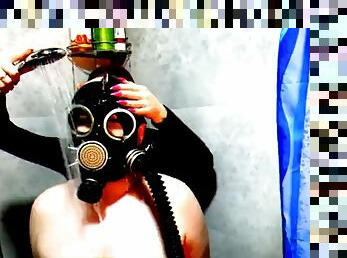 Halloween is coming! Scary video of a gas mask fetish in the shower