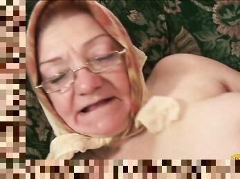 Dirty granny sucks a large dick and gets fucked on the sofa